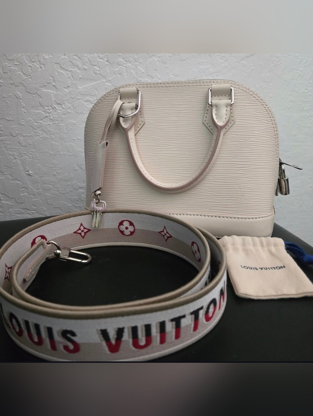 Louis Vuitton Cream Epi Alma BB with Branded Strap